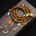 Huígē Zhēnshēn(回格真身) · Adorn — Tibetan Multi-Treasure Yak Bone Pendant Necklace | 108 Root-Fixed Beads · Corpse Buddha Motif