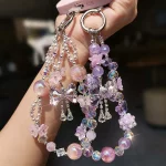Jīngyì Huāliàn（晶艺花链) · NoEnName_Null — Exquisite Handmade Bead Bow Phone Lanyard | Luxury Crystal Flower Mobile Charm · Wrist Strap Keychain for Women