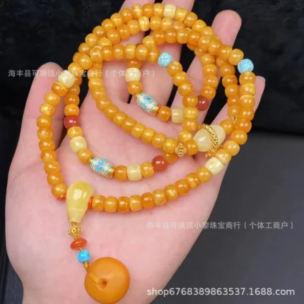 Huīyàn Luòyǔ（晖琰落玉) · Hetianara — Beeswax Backflow Pendant | 108 Old-Styled Amber Beads · Water Drop Geometry · Punk Ethnic Jewelry with Natural Turquoise
