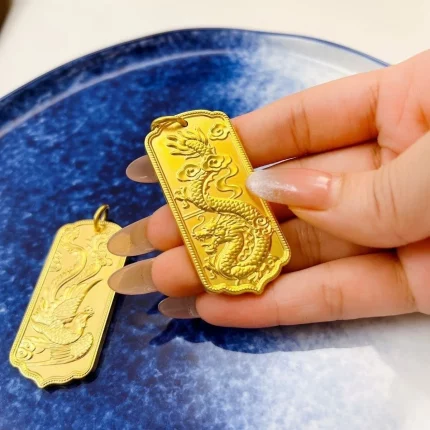 Lóngfèng Róngyù（龙凤荣玉) · Adorn — 24K Gold Dragon-Phoenix Pendant | AU999 Pure Gold · 3D Intertwined Design · Ruby Eyes for Perfect Union